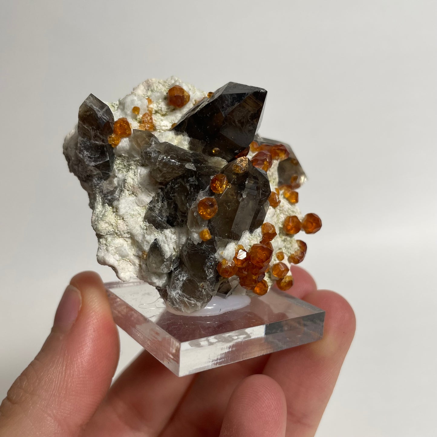 Smoky Quartz and Spessartine Specimen from Wushan Mine, China