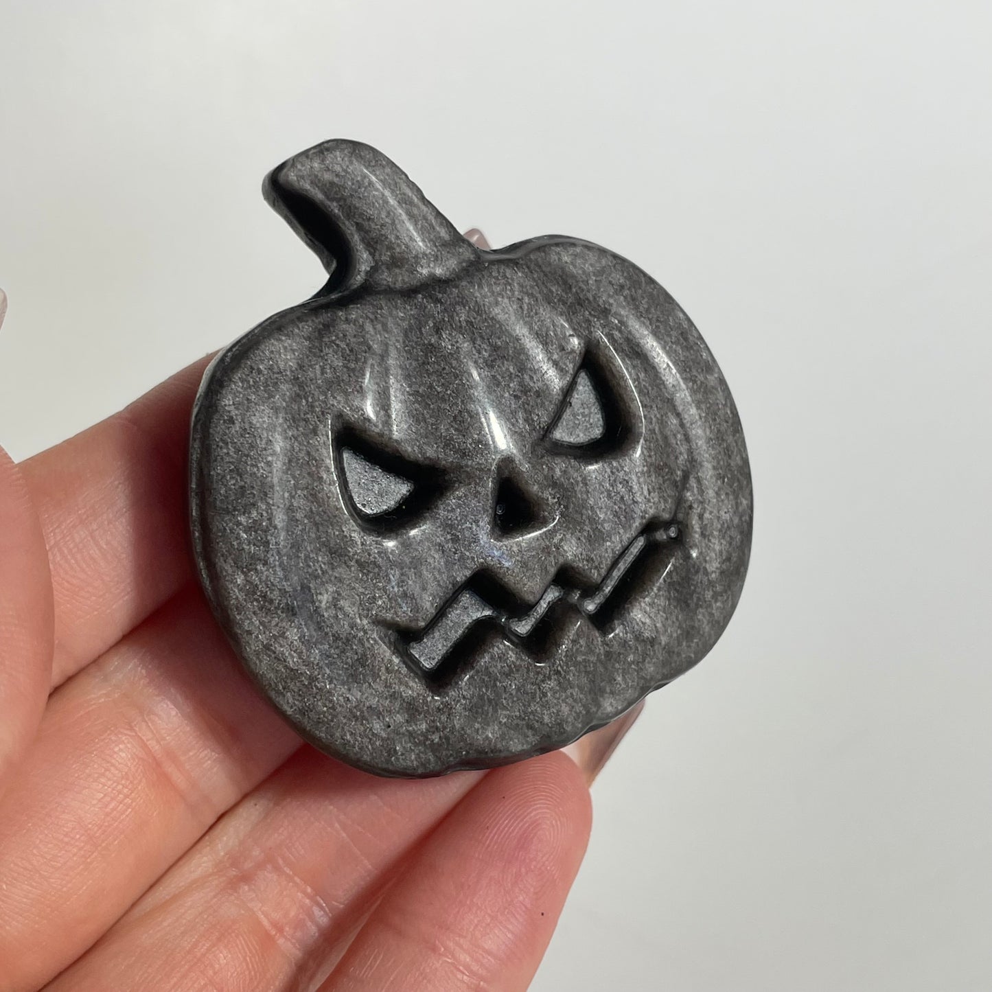 Silver and Gold Sheen Obsidian Jack-o-Lantern Carving