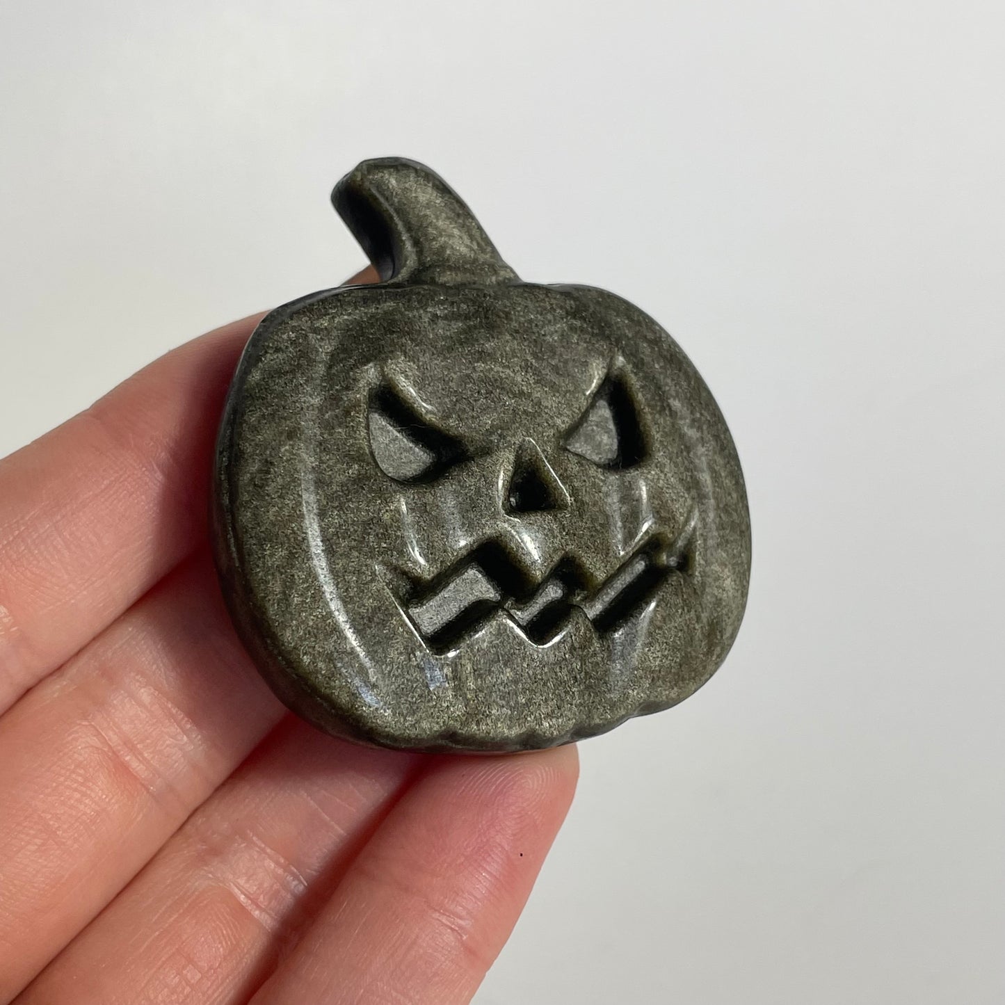 Silver and Gold Sheen Obsidian Jack-o-Lantern Carving